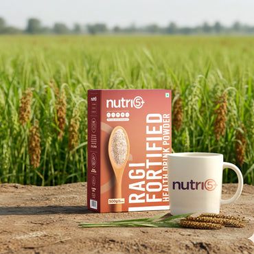 NutriS Ragi Fortified Health Drink Powder box and mug with a field background